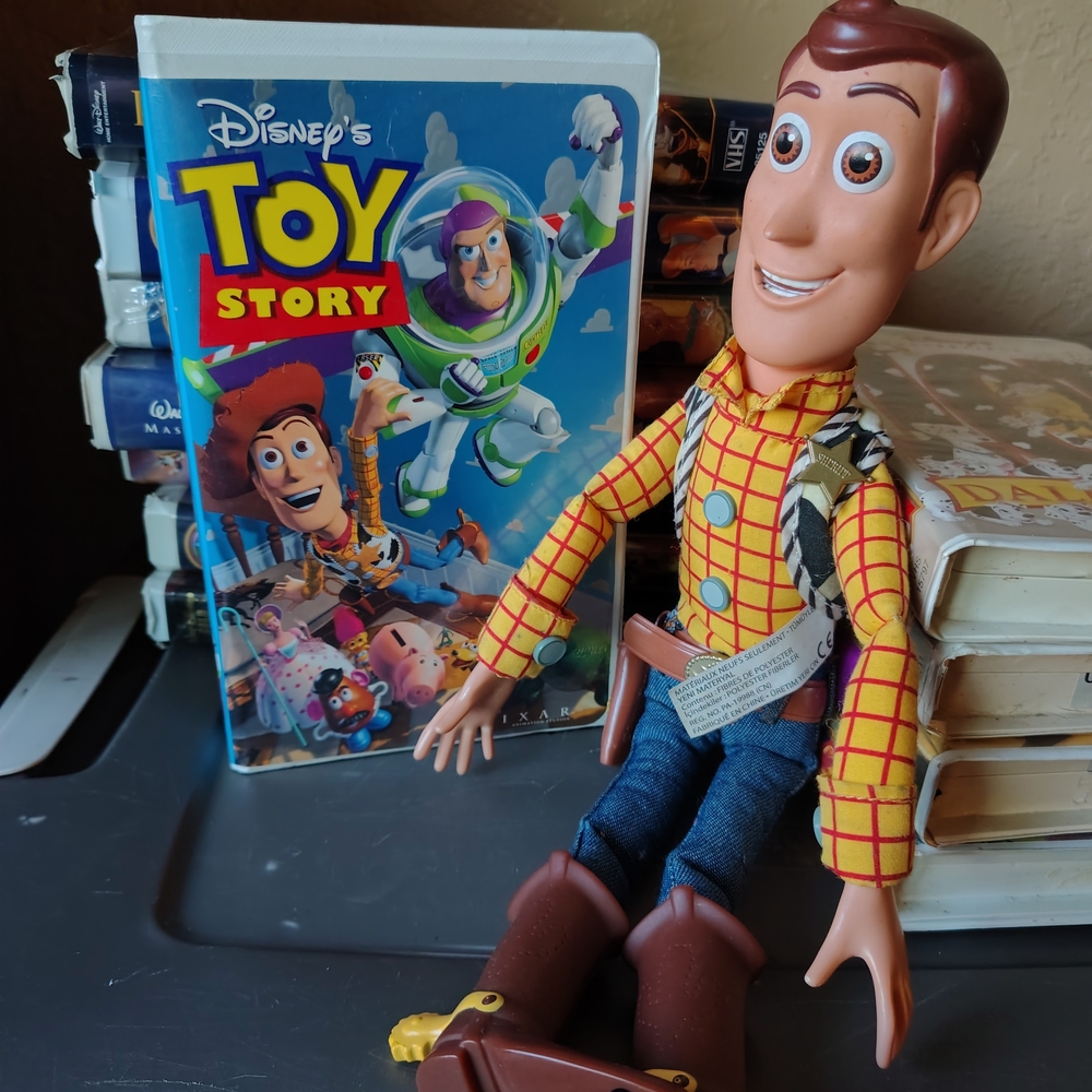 Disney Toy Story Woody 12-inch Posable Cowboy Doll And VHS TAPE DUO